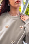 Sudadera corazones dorados