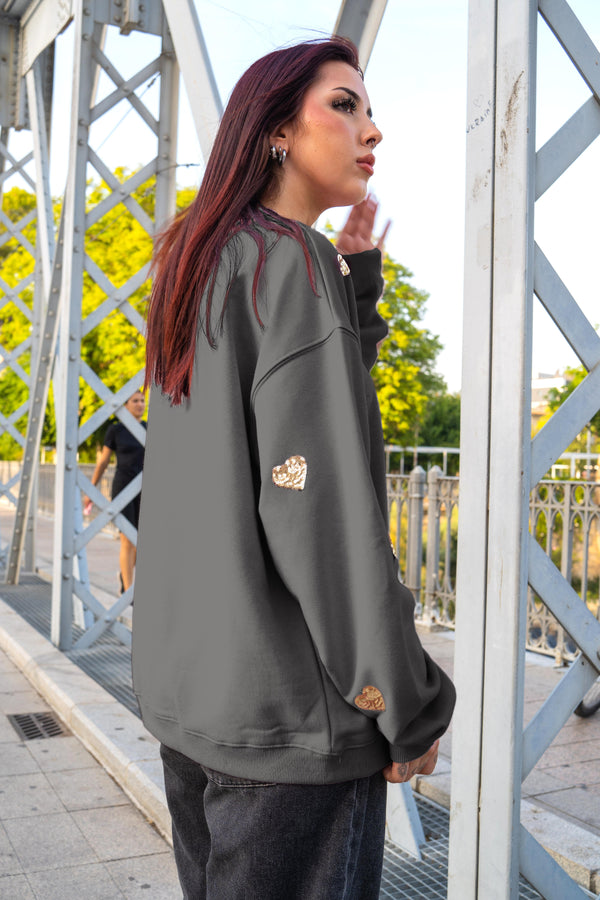 Sudadera corazones dorados