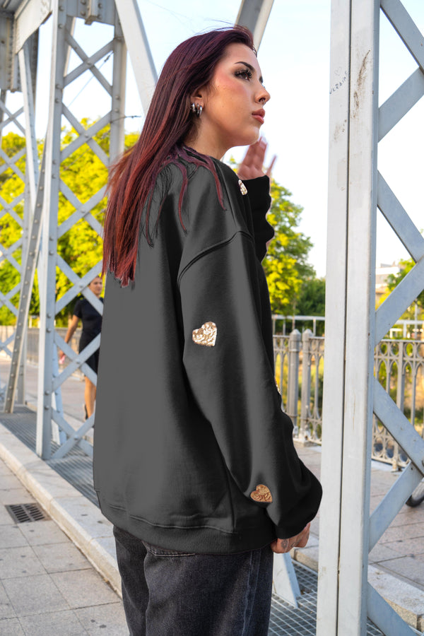 Sudadera corazones dorados
