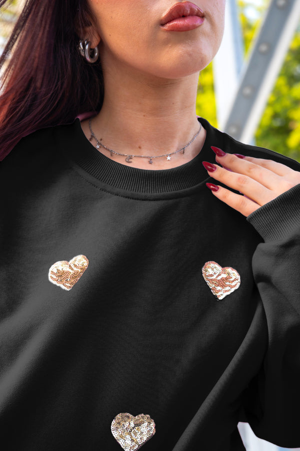 Sudadera corazones dorados