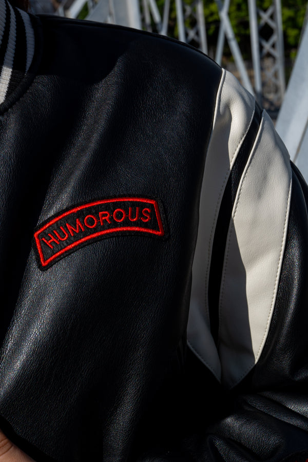 Cazadora polipiel bordada