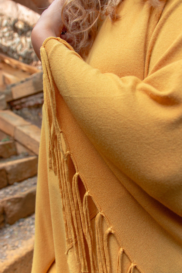 Poncho con flecos