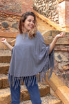 Poncho con flecos