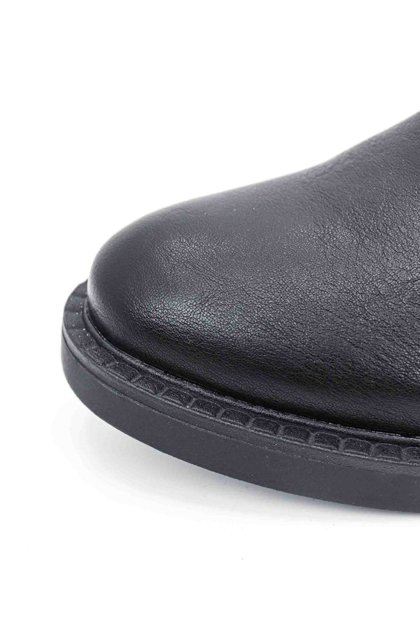 Botas planas de caña alta