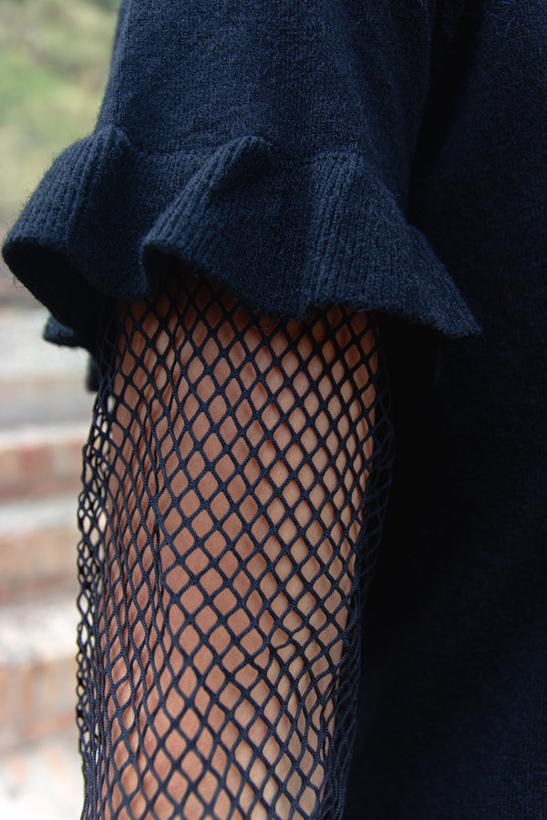 Vestido con mangas rejilla