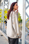 Sudadera corazones dorados