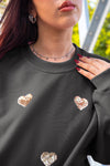 Sudadera corazones dorados