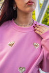 Sudadera corazones dorados