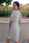 Vestido corto cruzado manga abombada.